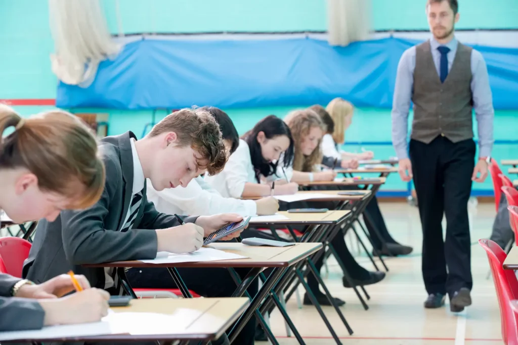 Why are secondary school exams important for further education in the UK